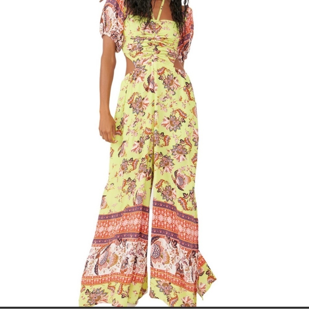 Free People Wide Leg Puff Sleeve Bali Citrus Skies Lime Jumpsuit size Medium.